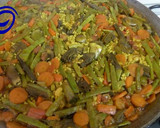 Foto del paso 7 de la receta: Arroz en "paella" de alcachofas y jamón serrano