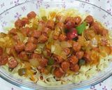 Foto del paso 6 de la receta: Pasta al huevo con salchichas rojas en salsa