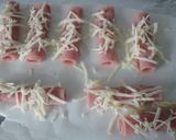 Foto del paso 4 de la receta: Rollitos de york y espárragos con ensalada