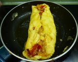Foto del paso 6 de la receta: Tortilla francesa rellena de pimiento rojo y amarillo