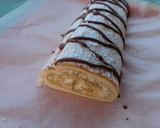 Foto del paso 9 de la receta: Brazo de gitano relleno de nata, dulce de leche y manzana
