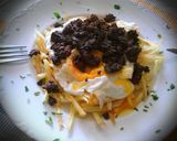 Foto del paso 3 de la receta: Huevos rotos estrellados con morcilla
