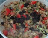 A picture of step 3 of Italian Peppers Stuffed with Tabbouleh.