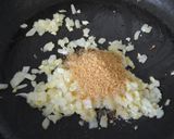 Foto del paso 5 de la receta: Berenjena caramelizada al ajo y cebolla