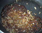 Foto del paso 6 de la receta: Berenjena caramelizada al ajo y cebolla