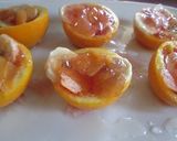 Foto del paso 7 de la receta: Naranjitas en almíbar rellenas de gelatina y frutas