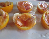 Foto del paso 7 de la receta: Naranjitas en almíbar rellenas de gelatina y frutas