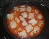 Foto del paso 6 de la receta: Bacalao en salsa de tomate con patatas fritas