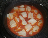 Foto del paso 6 de la receta: Bacalao en salsa de tomate con patatas fritas