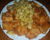Foto del paso 7 de la receta: Bacalao en salsa de tomate con patatas fritas