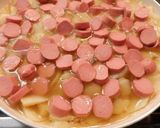 Foto del paso 4 de la receta: Tortilla de patatas con salchichas de pollo