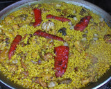 Foto del paso 7 de la receta: Arroz con conejo y caracoles hecho con leña